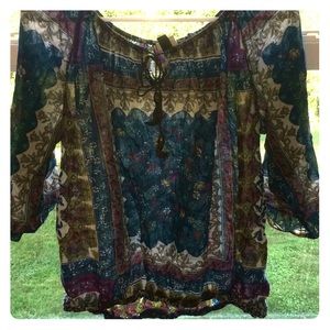 Sheer off shoulder shirt